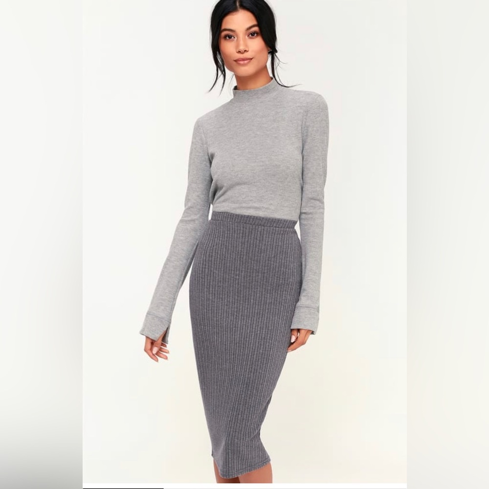 Charcoal gray knit pencil skirt. Size small.